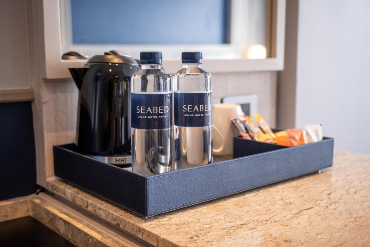 Seabed Grand Hotel Phuket - Sha Extra Plus Eksteriør billede SeaBear water bottles