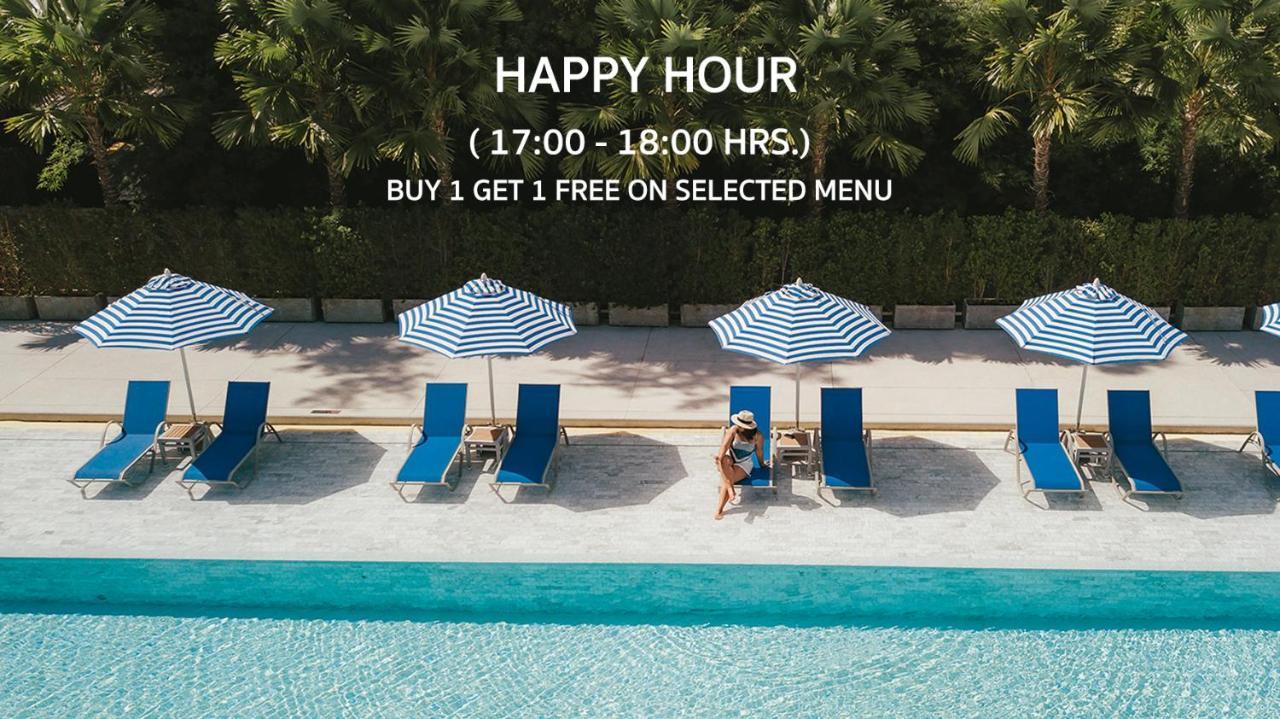Seabed Grand Hotel Phuket - Sha Extra Plus Eksteriør billede Happy hour at a pool